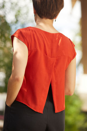 Picture of back slit top in orange red