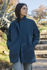 Picture of the "cocoon" coat in teal blue