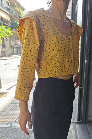 Picture of poor things mustard black